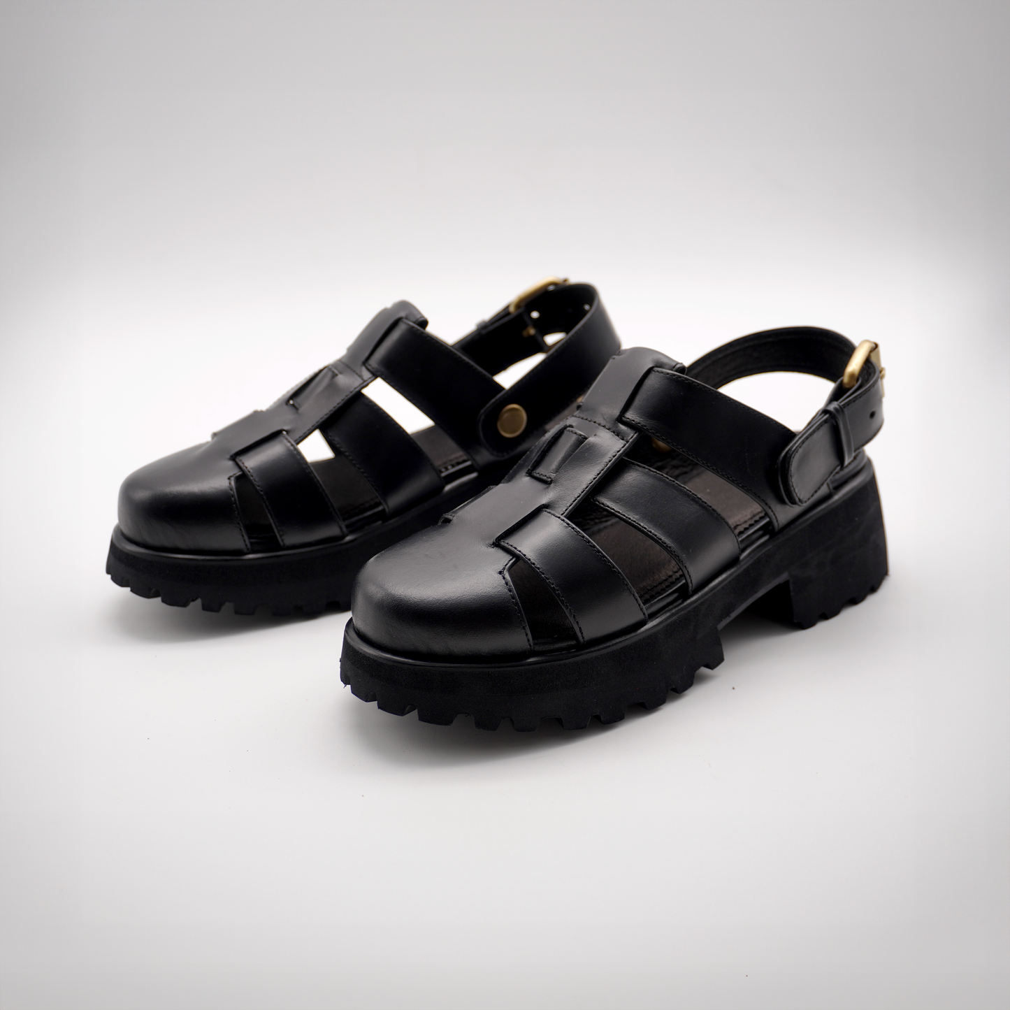 Evy Fisherman Mules (Black)