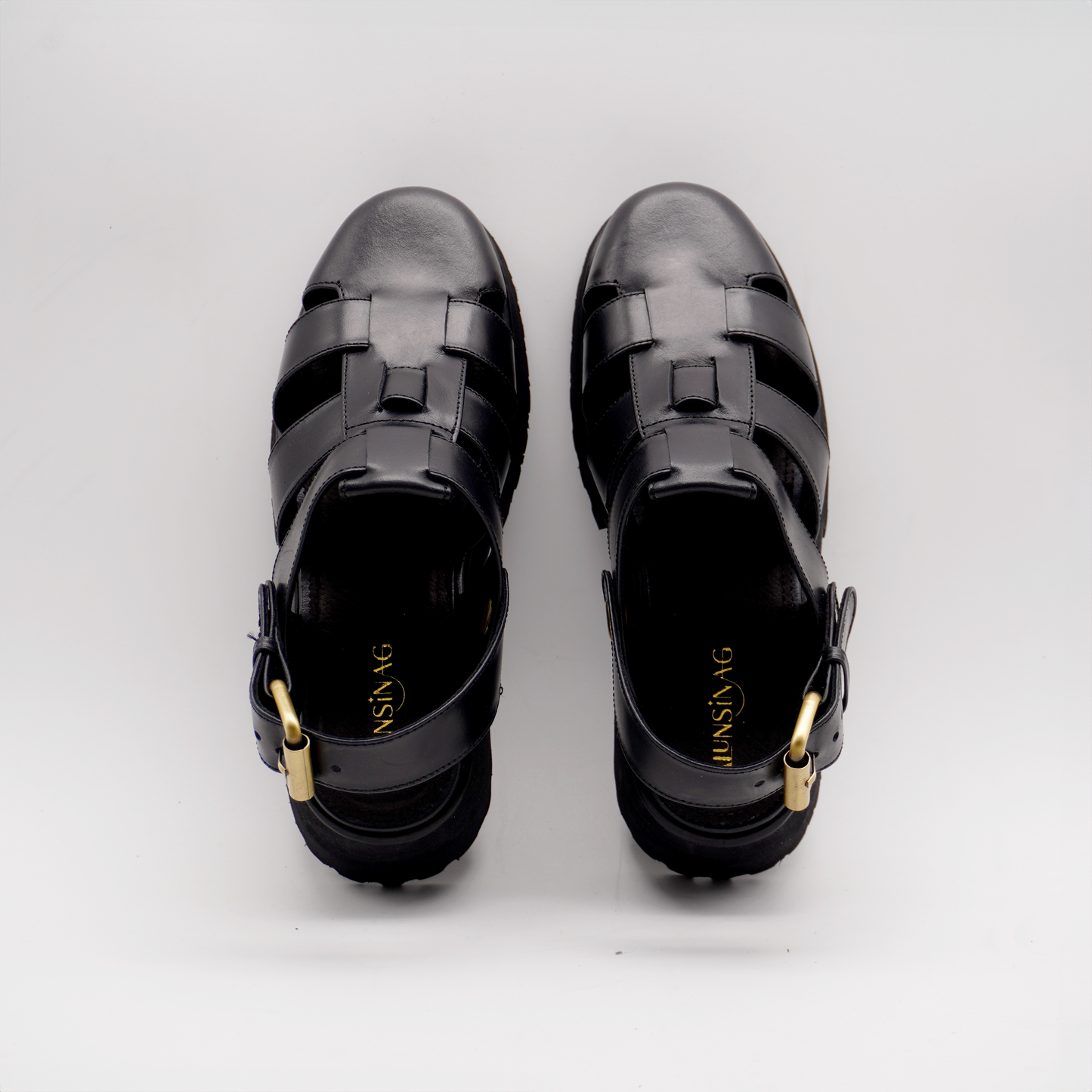 Evy Fisherman Mules (Black)
