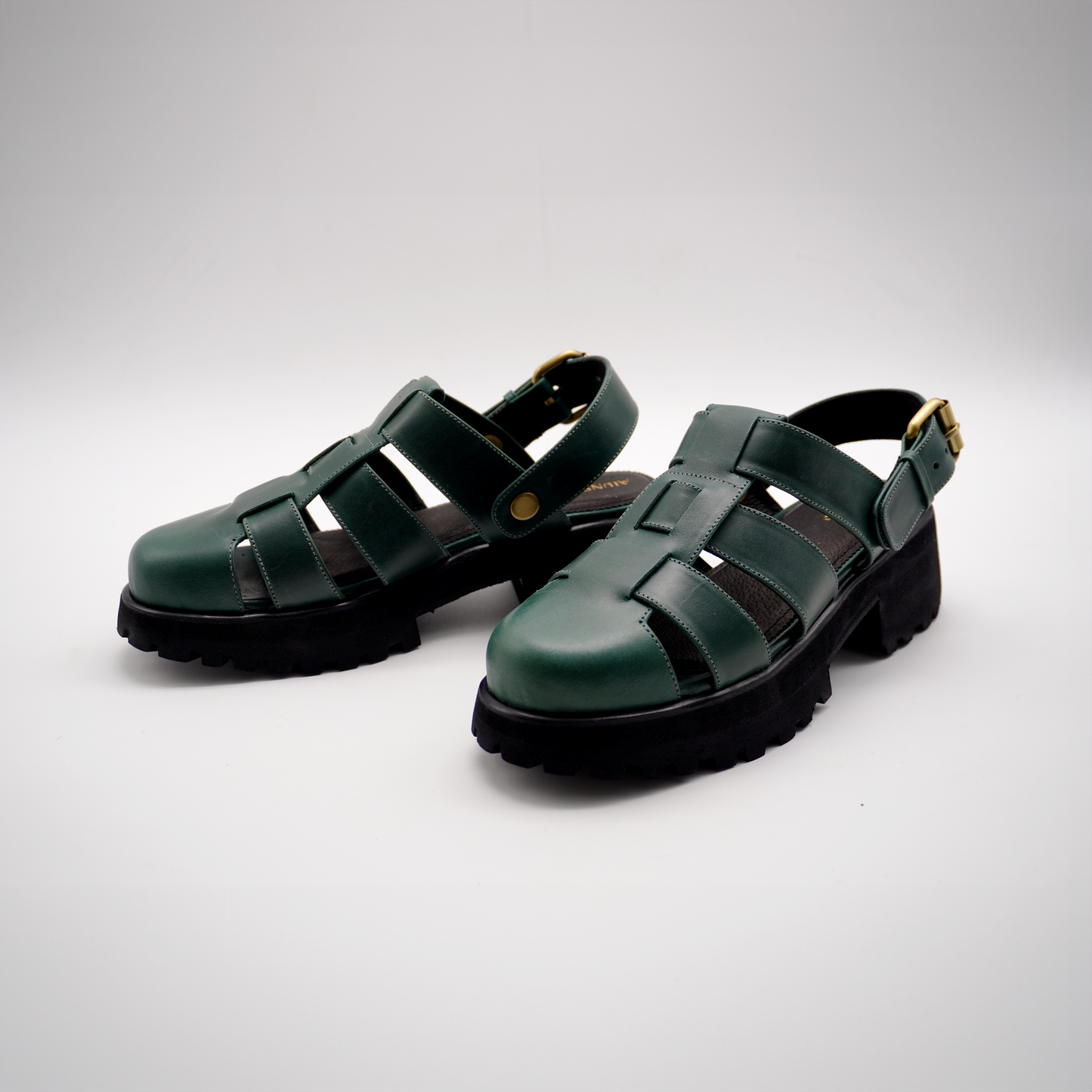 Evy Fisherman Mules (Emerald Green)